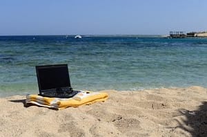 laptop near beach